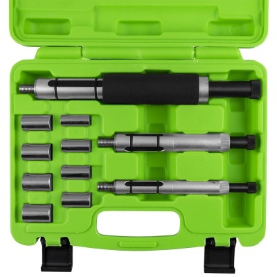 Conjunto de ferramentas metalicas em estojo verde com adaptadores e extensores.