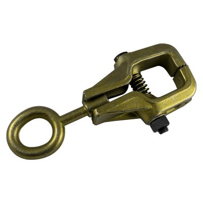 Aparelho metálico dourado com anel circular e mola