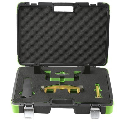 estojo preto e verde com ferramentas de alinhamento de motor em espuma preta