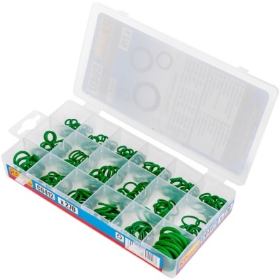 Caixa plástica com anéis de vedação verdes sorteados em compartimentos