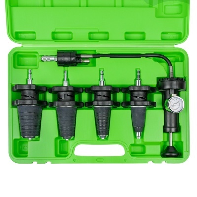 Conjunto de ferramentas de medição com cinco cones de borracha e manómetro num estojo verde