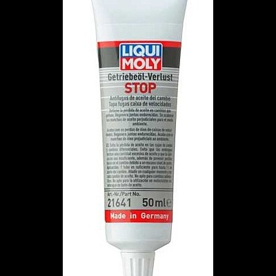 Tubo branco com tampa de rosca com texto Liqui Moly para parar perda de óleo