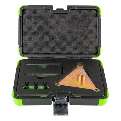 estojo preto e verde com ferramenta triangular dourada e acessórios em espuma preta