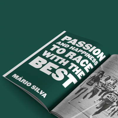 Livro aberto com capa verde escura, texto branco e fotografia de corrida em preto e branco.