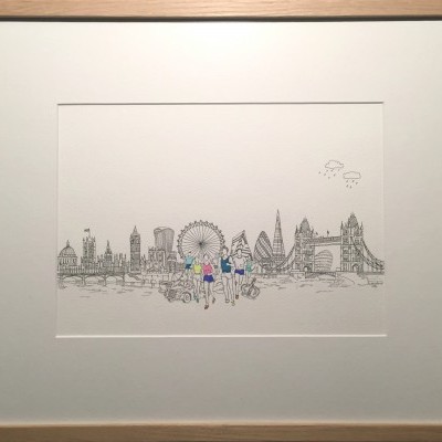 Desenho artístico de Londres com pessoas vestindo camisolas coloridas em moldura de madeira