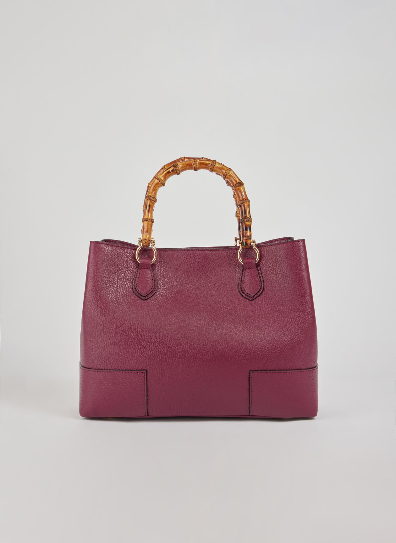 MALA EM PELE ITALIANA AMALFI BURGUNDY | TUSCAN Mala de mão castanho-avermelhada com punhos de bambu