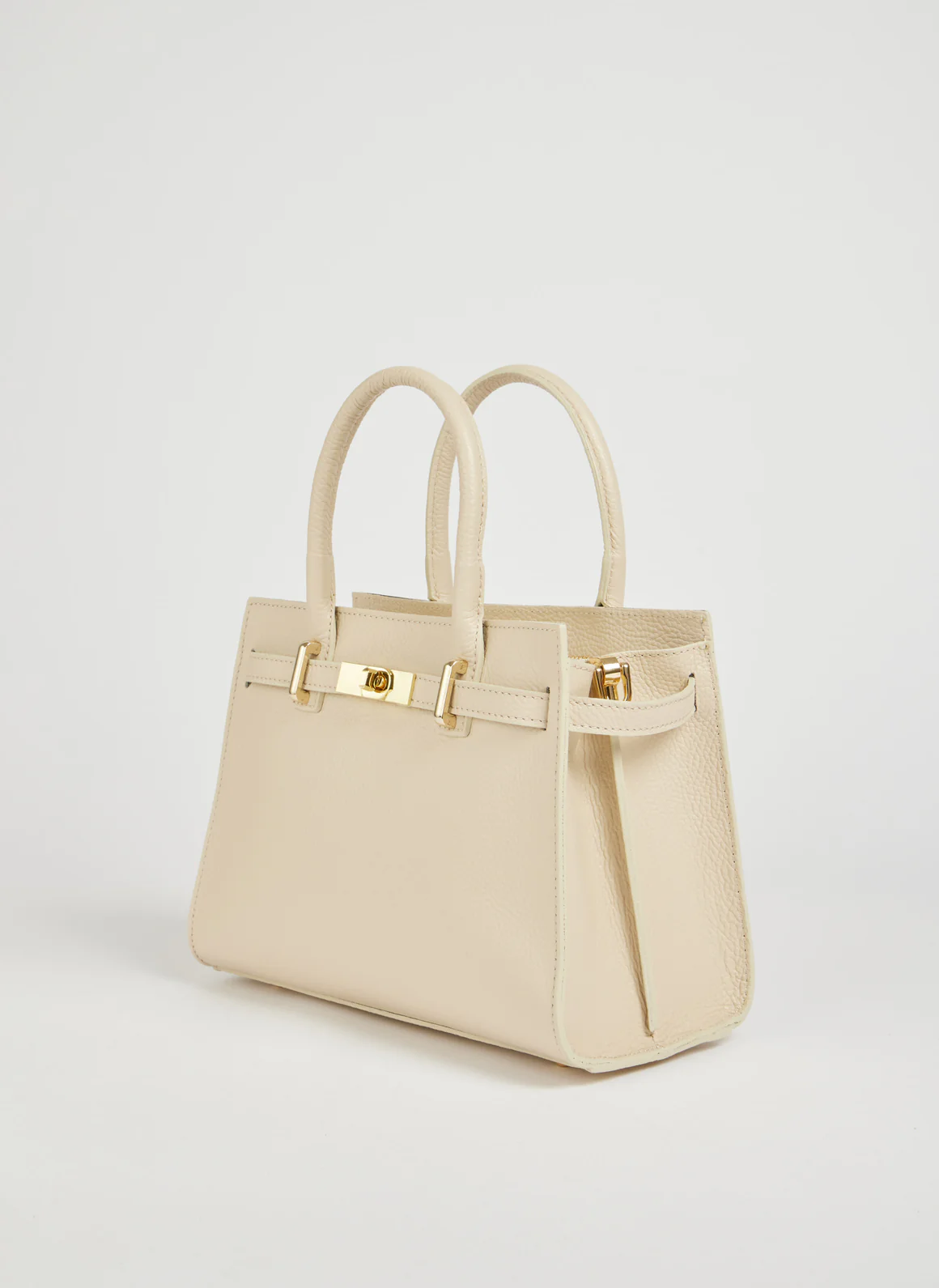 MALA EM PELE ITALIANA PORTOFINO CREAM | TUSCAN Mala de mão bege em pele com fecho dourado