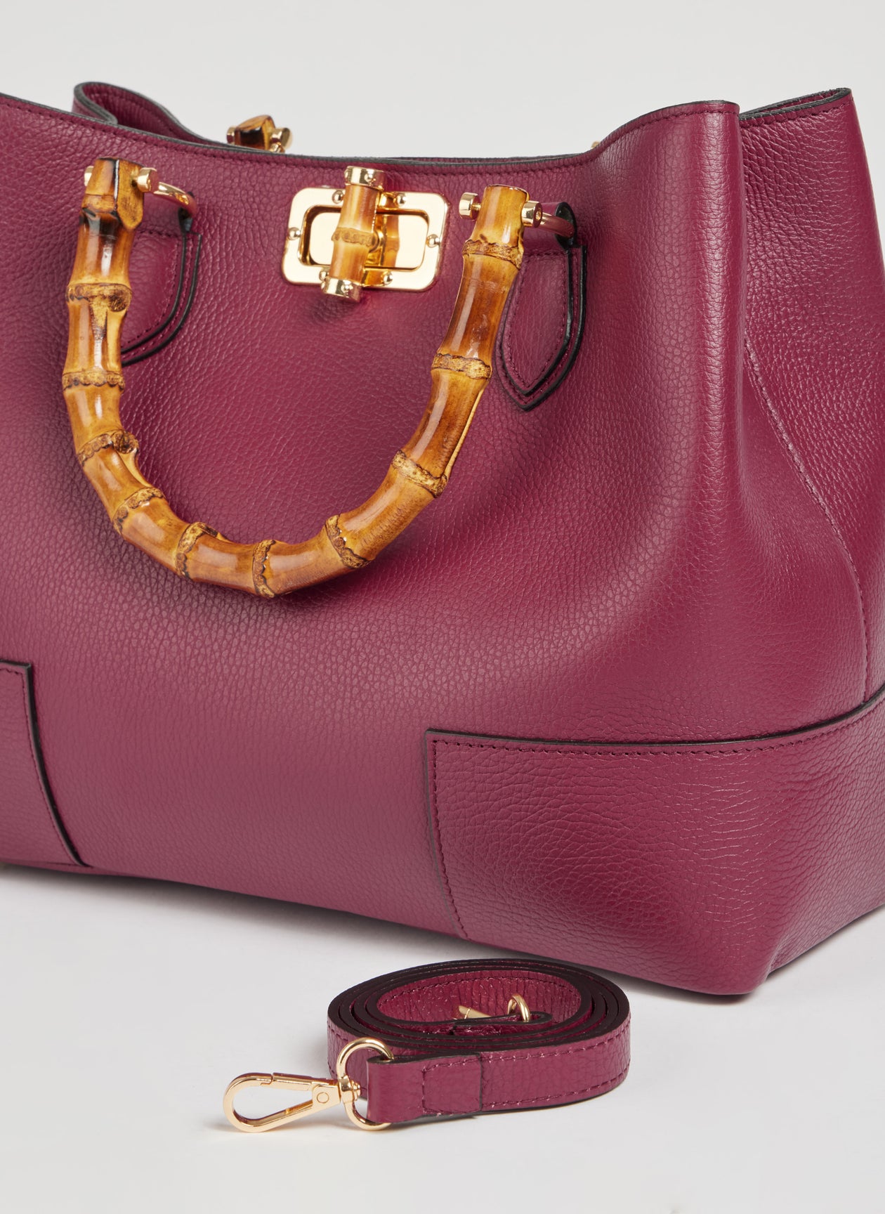 MALA EM PELE ITALIANA AMALFI BURGUNDY | TUSCAN Mala em pele vinho com alças em bambu e alça destacável