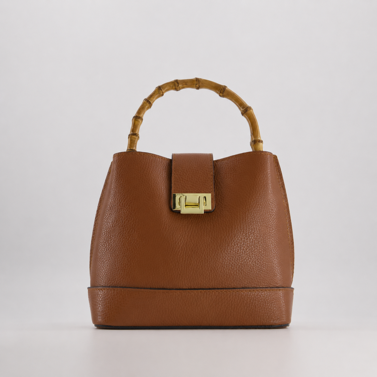 MALA EM PELE ITALIANA LIVORNO CONHAQUE | TUSCAN Mala castanha de mão com alça em bambu e fecho dourado