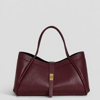 Mala de mão castanho escuro em pele sintética com fecho dourado