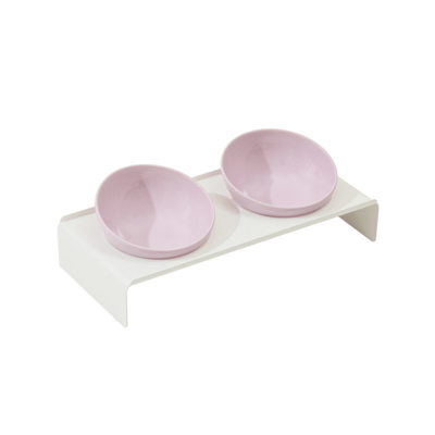 Conjunto de duas taças cor-de-rosa em suporte branco