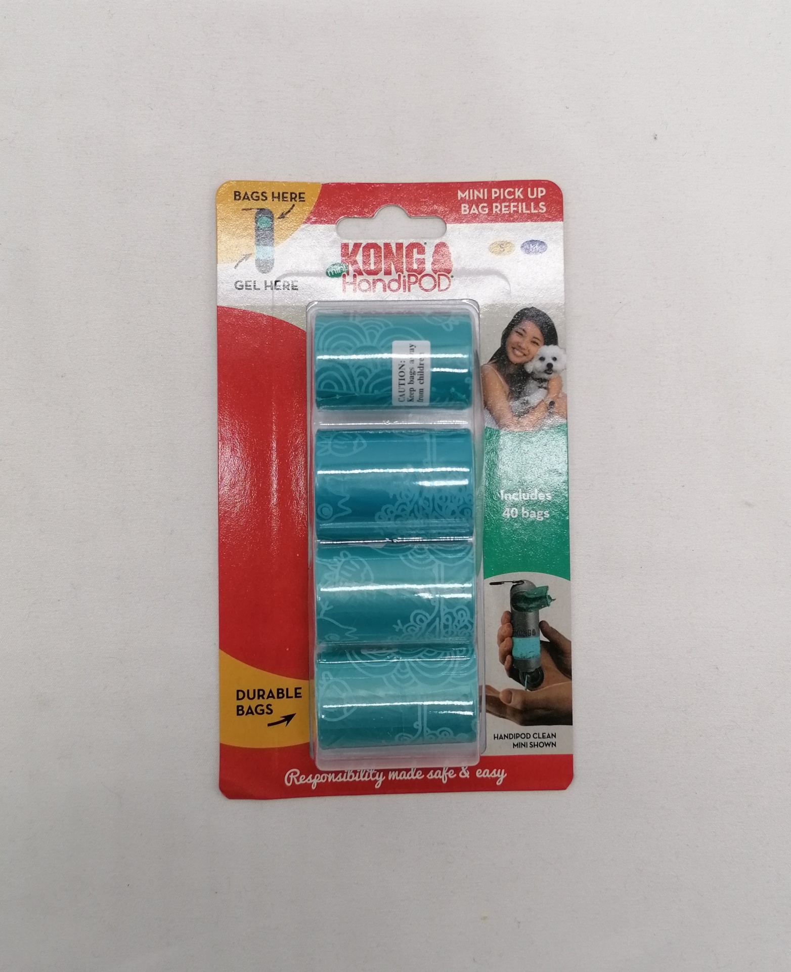 Recargas sacos caninos azuis com padrão branco em embalagem cartão