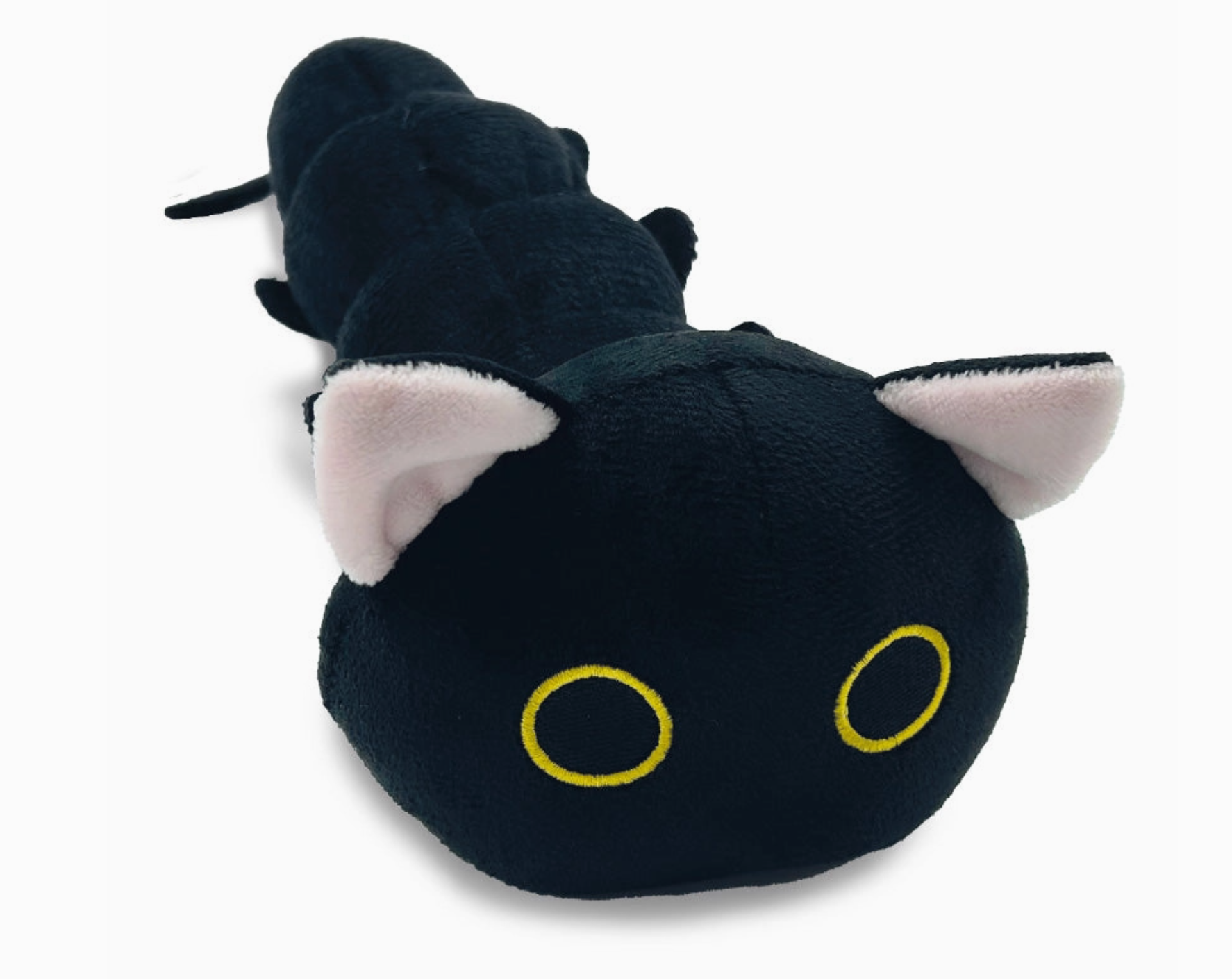 Pelúcia de gato preto com olhos amarelos e orelhas cor de rosa