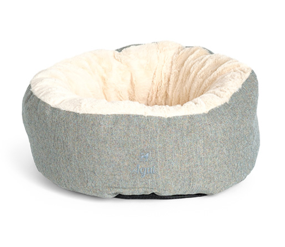 Cama redonda para animais em tecido cinzento e interior creme peludo