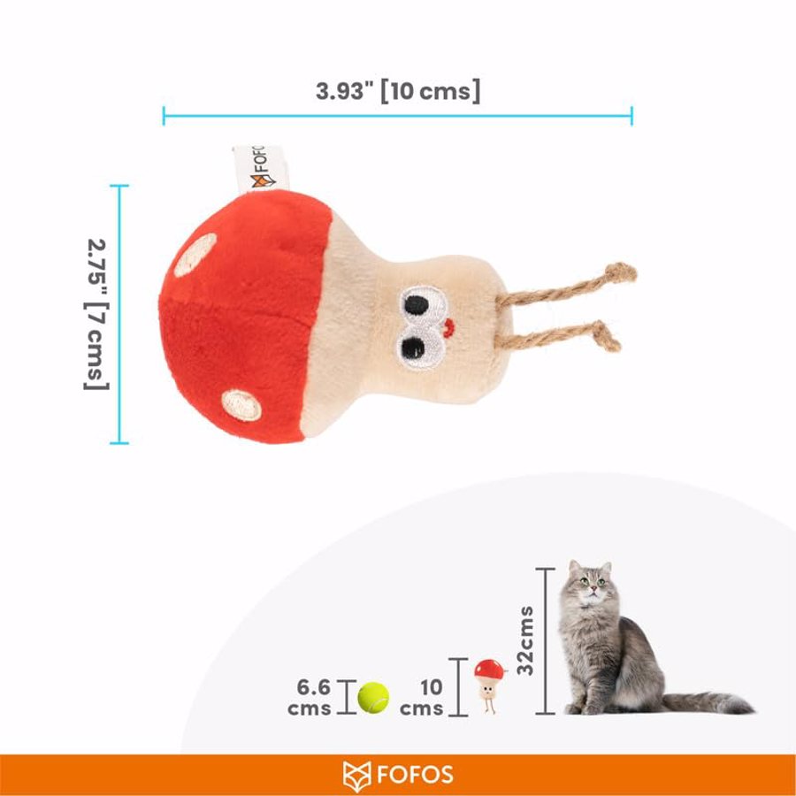 Brinquedo de pelúcia cogumelo vermelho e bege com olhos e cordas, fundo branco