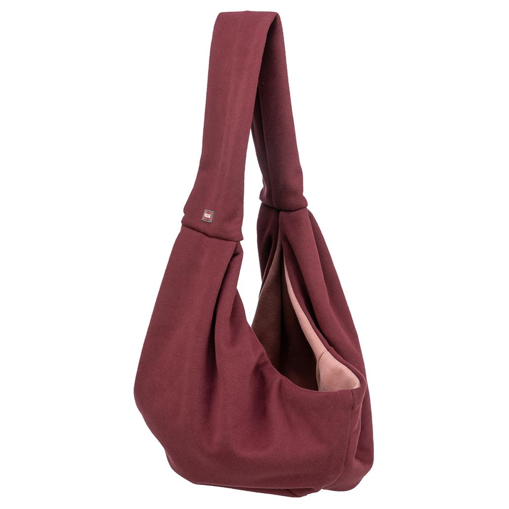 Saco de ombro vinho com interior rosa claro e etiqueta TOE