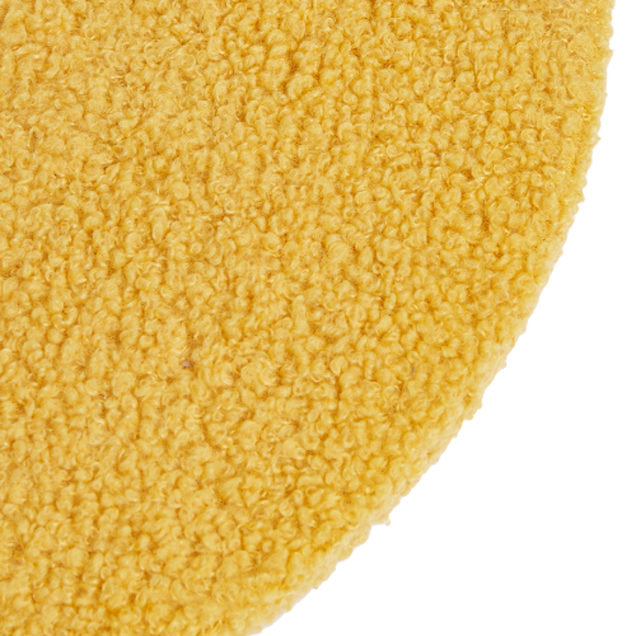 Tapete redondo amarelo felpudo com textura em círculos
