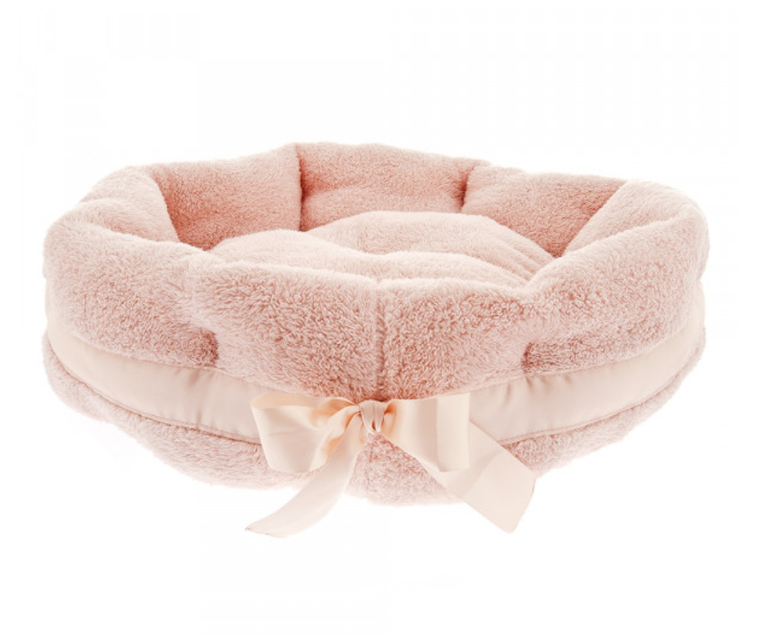 Cama redonda cor-de-rosa clara para animal de estimação com laço