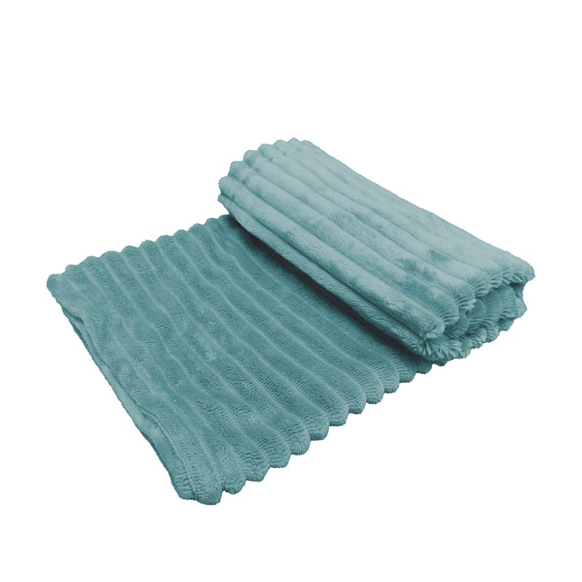 Manta azul turquesa felpuda com padrão ondulado dobrada