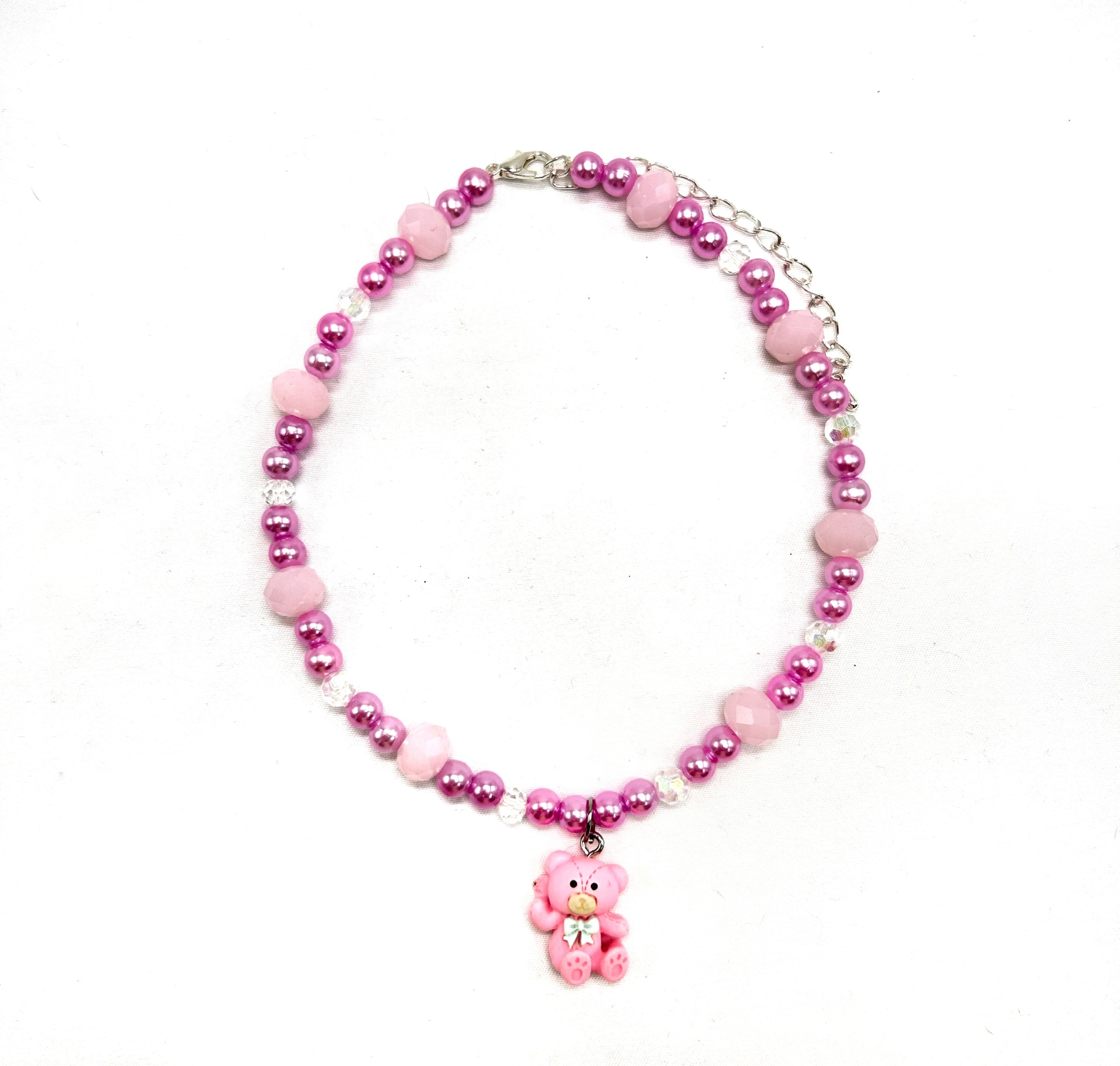 Colar infantil rosa com pendente de ursinho cor-de-rosa