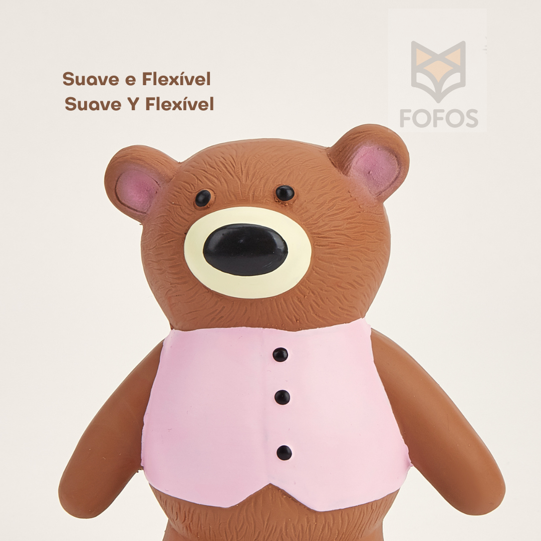 Cofrinho urso castanho com colete rosa e texto Suave e Flexível