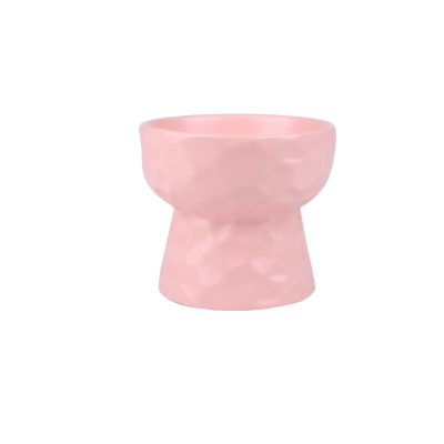 Tigela rosa em cerâmica com textura facetada