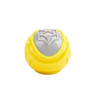 Dispositivo plástico amarelo e cinzento com padrão geométrico