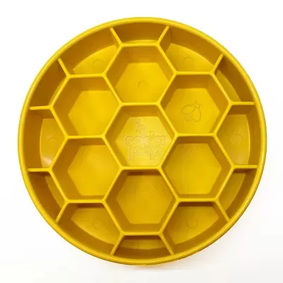Prato amarelo redondo com divisórias hexagonais e desenho de abelha
