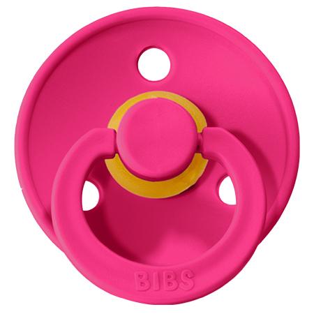 Chupeta de silicone rosa com detalhes amarelos e anel com a palavra BIBS