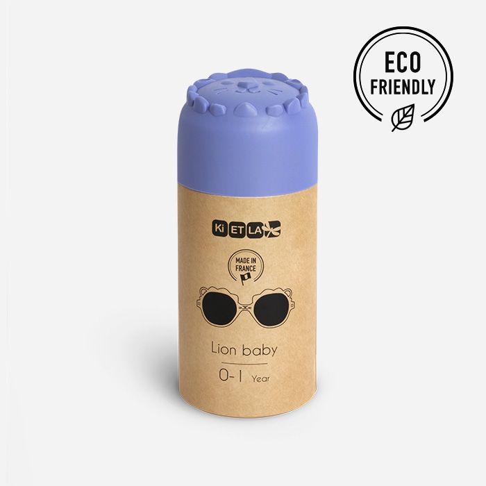 Embalagem cilíndrica para produto infantil com tampa roxa e texto em papel castanho