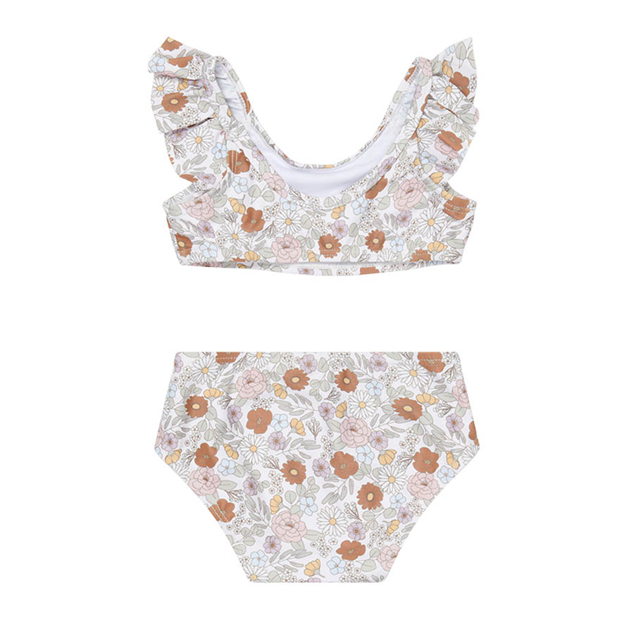 Conjunto de bikini infantil com padrão floral e folhos nas alças