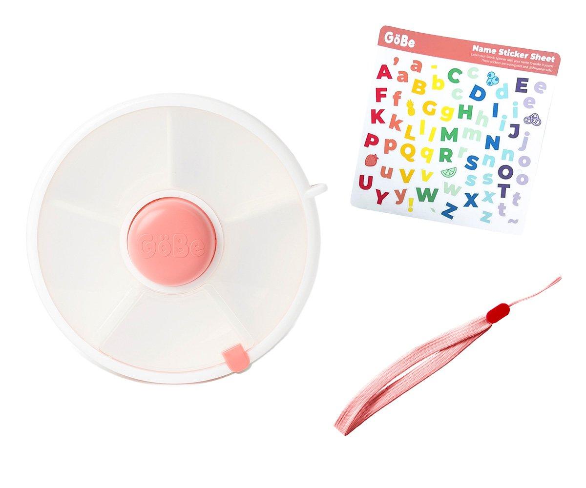 Dispensador redondo transparente com tampa rosa, autocolantes coloridos e cordão rosa para identificação.