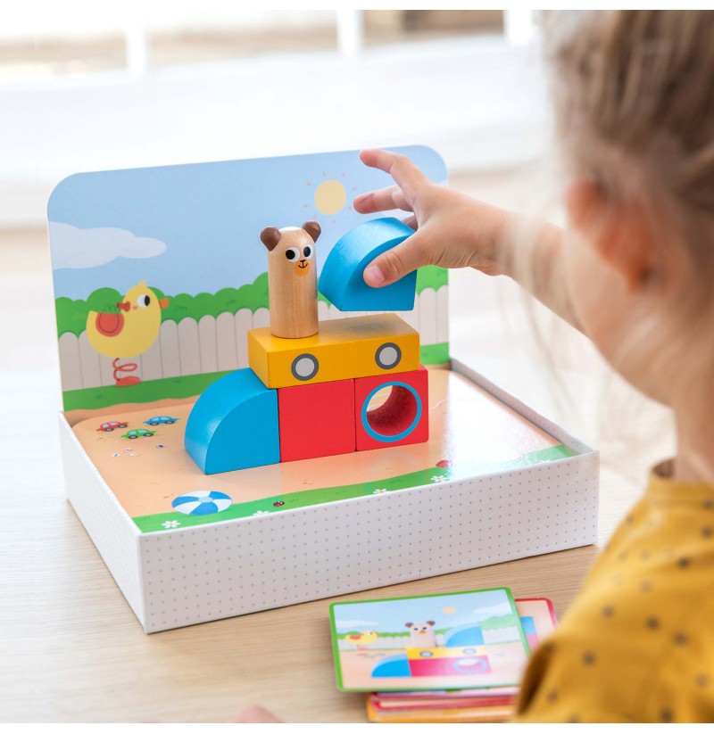 Brinquedo de madeira colorido com formas geométricas empilháveis e fundo ilustrado