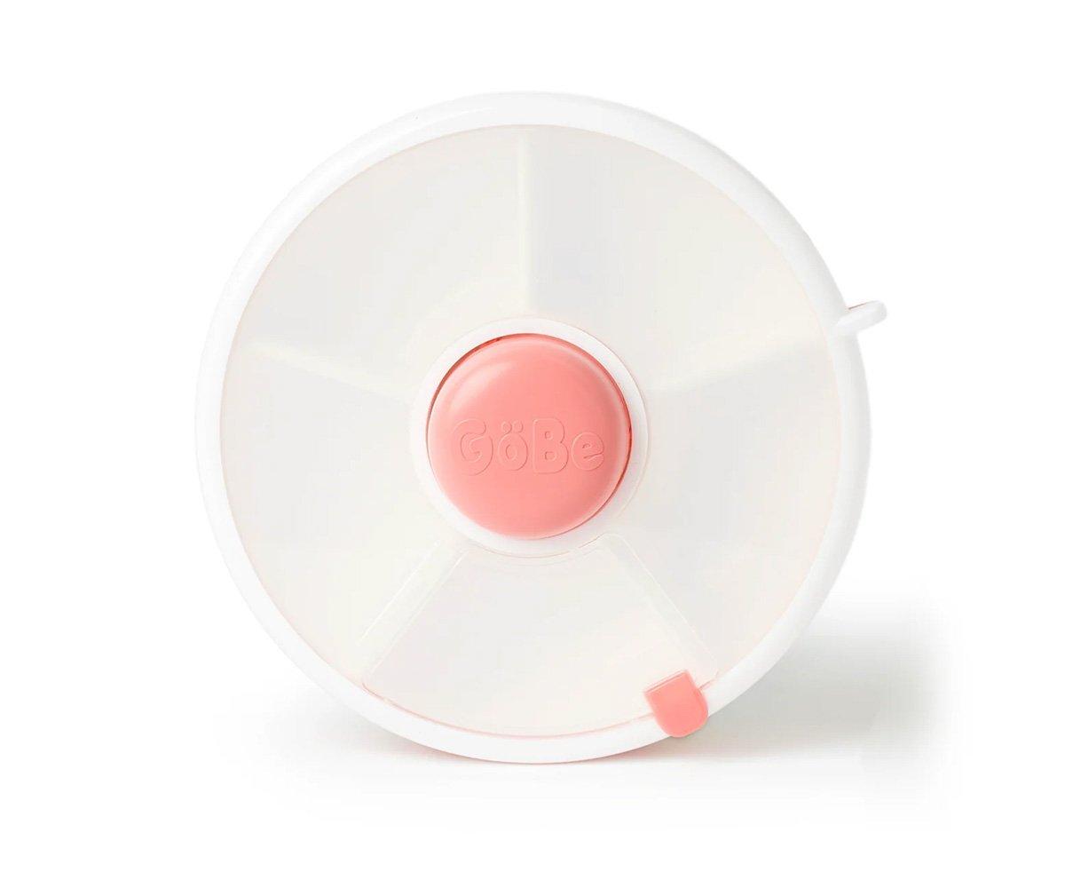 Recipiente redondo branco com tampa cor-de-rosa e divisórias internas