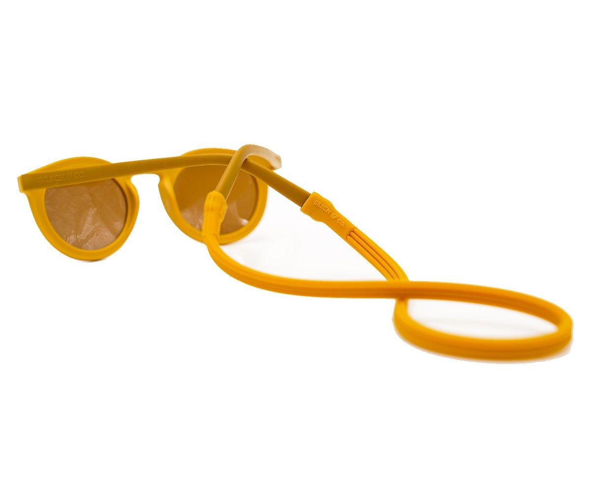 Óculos de sol amarelos com suporte de silicone amarelo