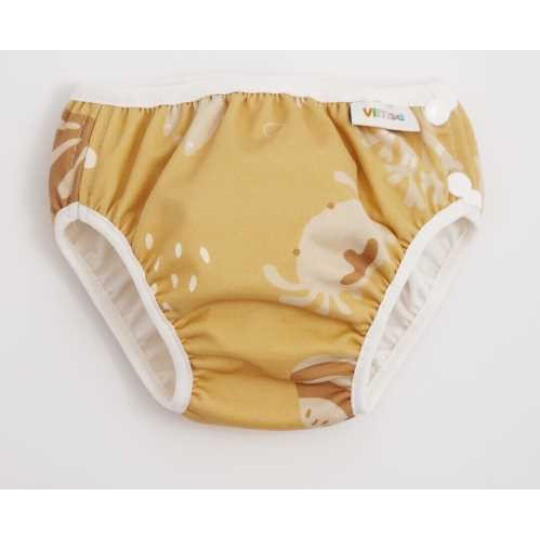 Cueca de bebê amarela com desenhos em tom claro e elástico branco