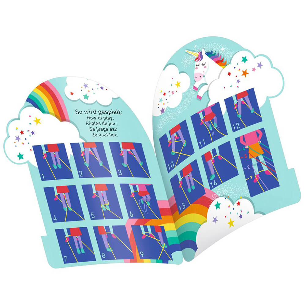 Livro infantil azul com unicórnio, arco-íris e instruções para jogar.