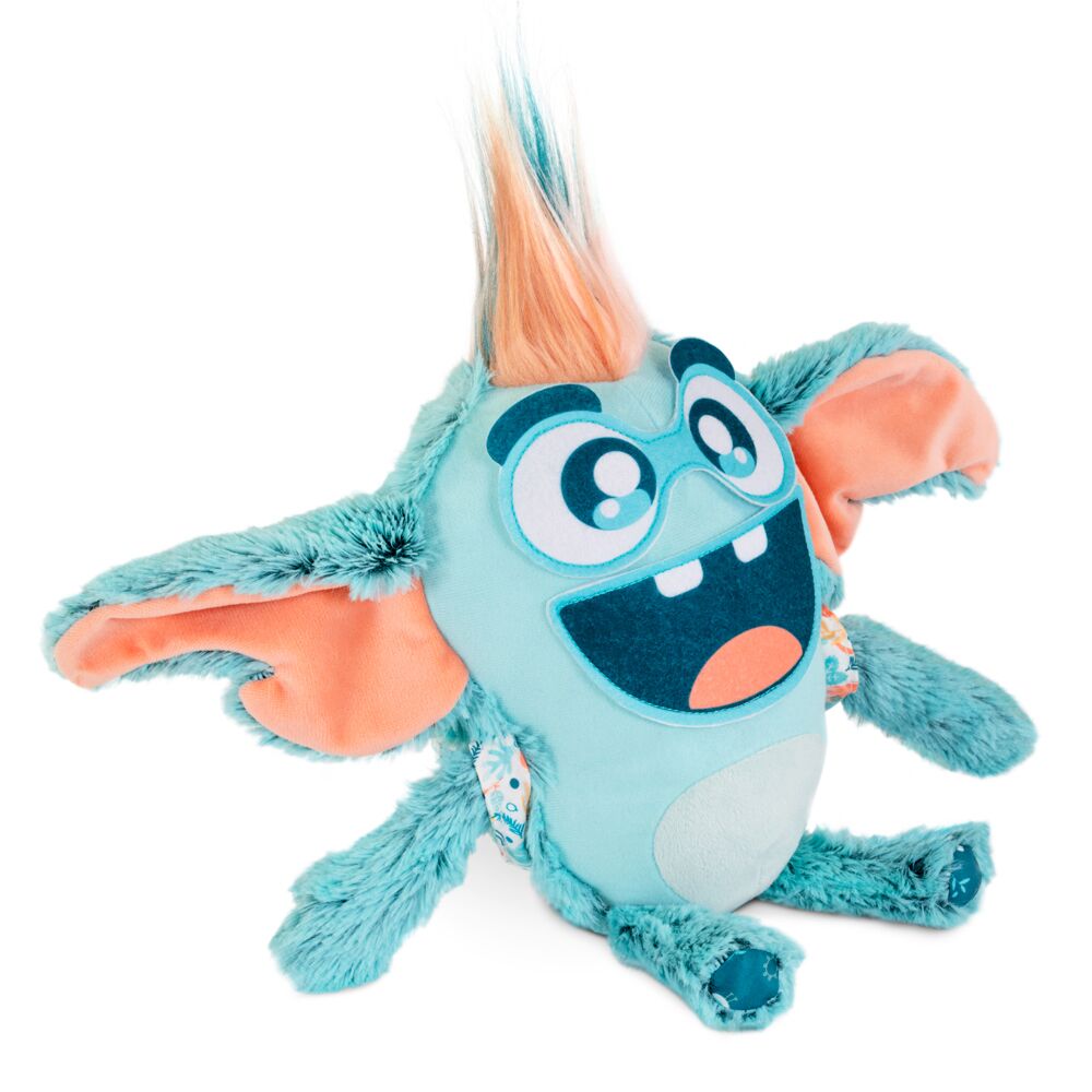 Pelúcia de monstro azul com orelhas cor-de-rosa e cabelo colorido