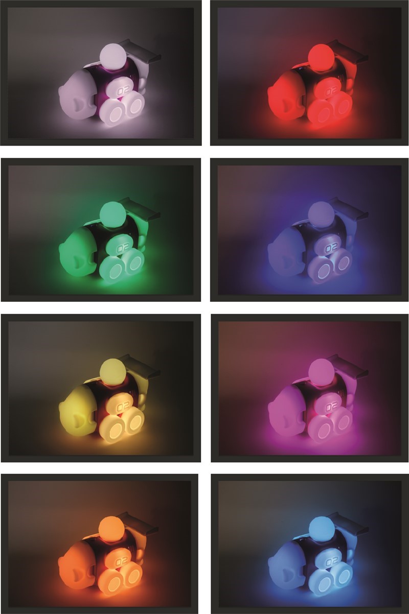 Figura robótica iluminada em várias cores num fundo escuro