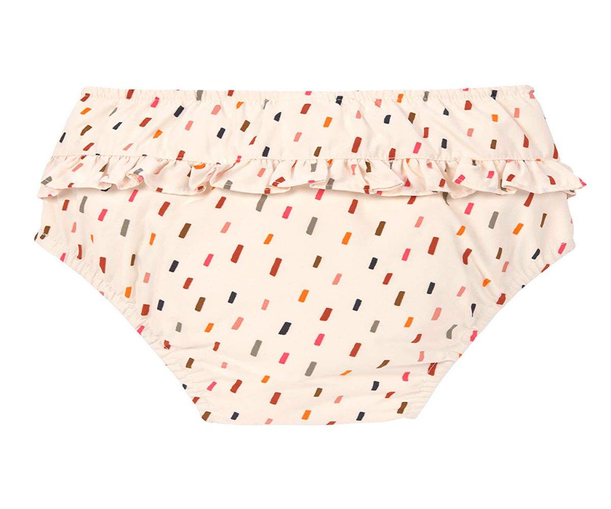 Cueca de bebé bege com padrão colorido e folho no topo