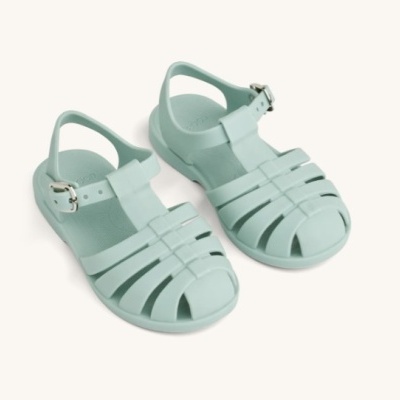 Sandálias de plástico verde-água para bebé com tiras entrelaçadas e fecho ajustável