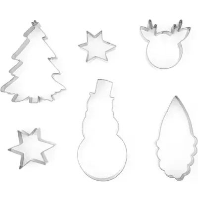 Cinco cortadores de metal para bolachas com formas natalícias sobre fundo branco