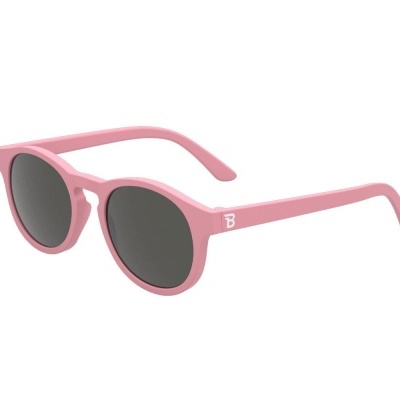 Óculos de sol rosa com lentes redondas cinzentas escuras e detalhe TB branco.