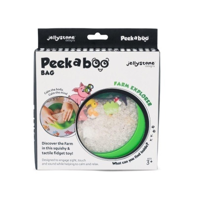 Embalagem de Peekaboo Bag com janela circular mostrando brinquedos e enchimento branco, texto e ilustração de porco.