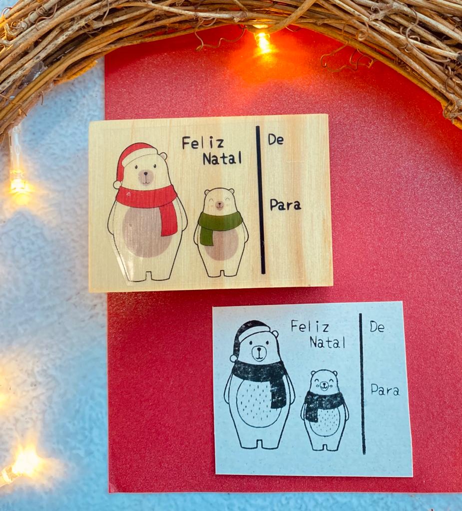 Carimbo de madeira com ursos e texto de Feliz Natal