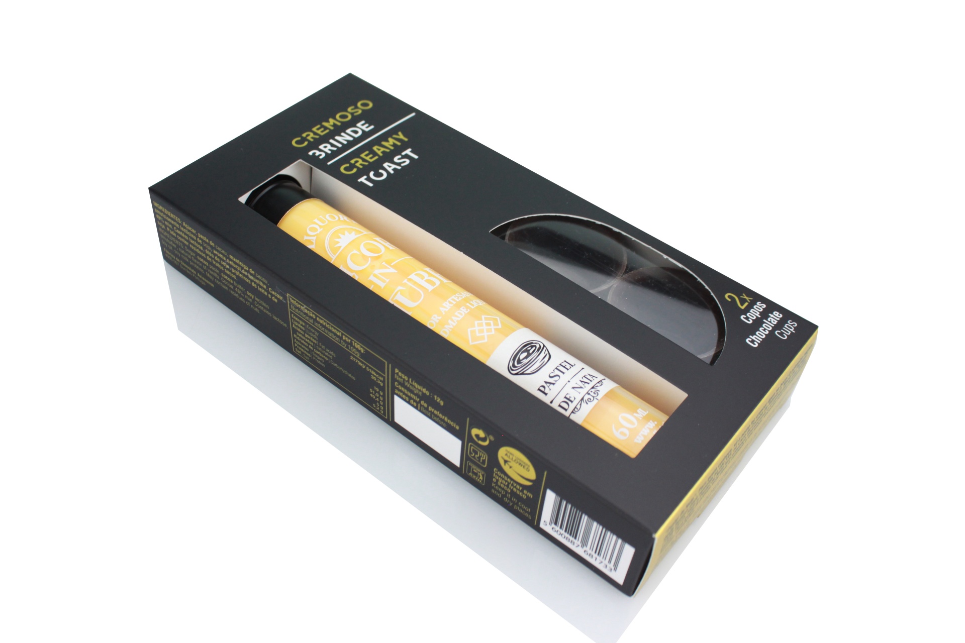 Cremoso Brinde Embalagem preta com tubo amarelo de licor e dois copos de chocolate