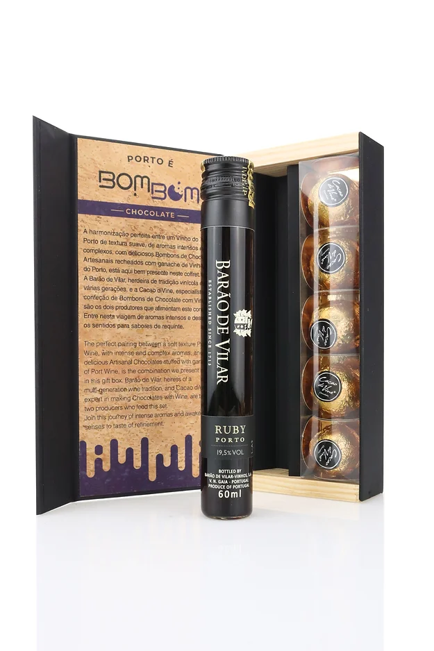 Porto é BomBom Caixa de produto com tubo preto e seis bombons de chocolate visíveis