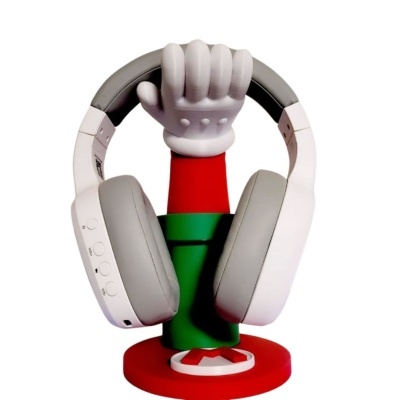 Suporte para auscultadores com mão branca e base colorida a segurar auscultadores brancos