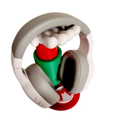 Auricular branco e cinza em suporte colorido estilo Super Mario