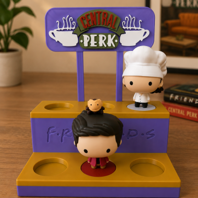 Expositor plástico com figuras vinil Friends e texto CENTRAL PERK.